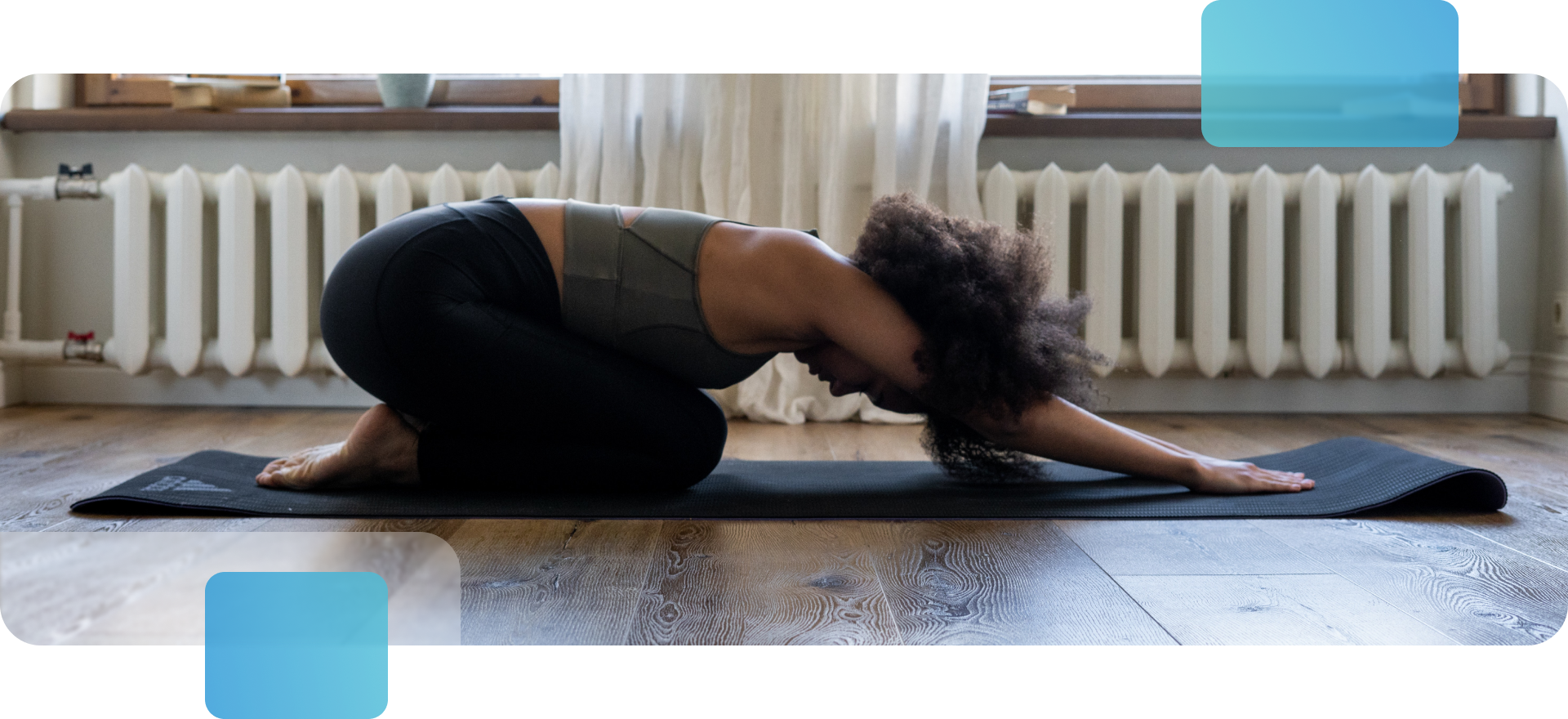 A woman practicing yoga to stress out in her apartment.